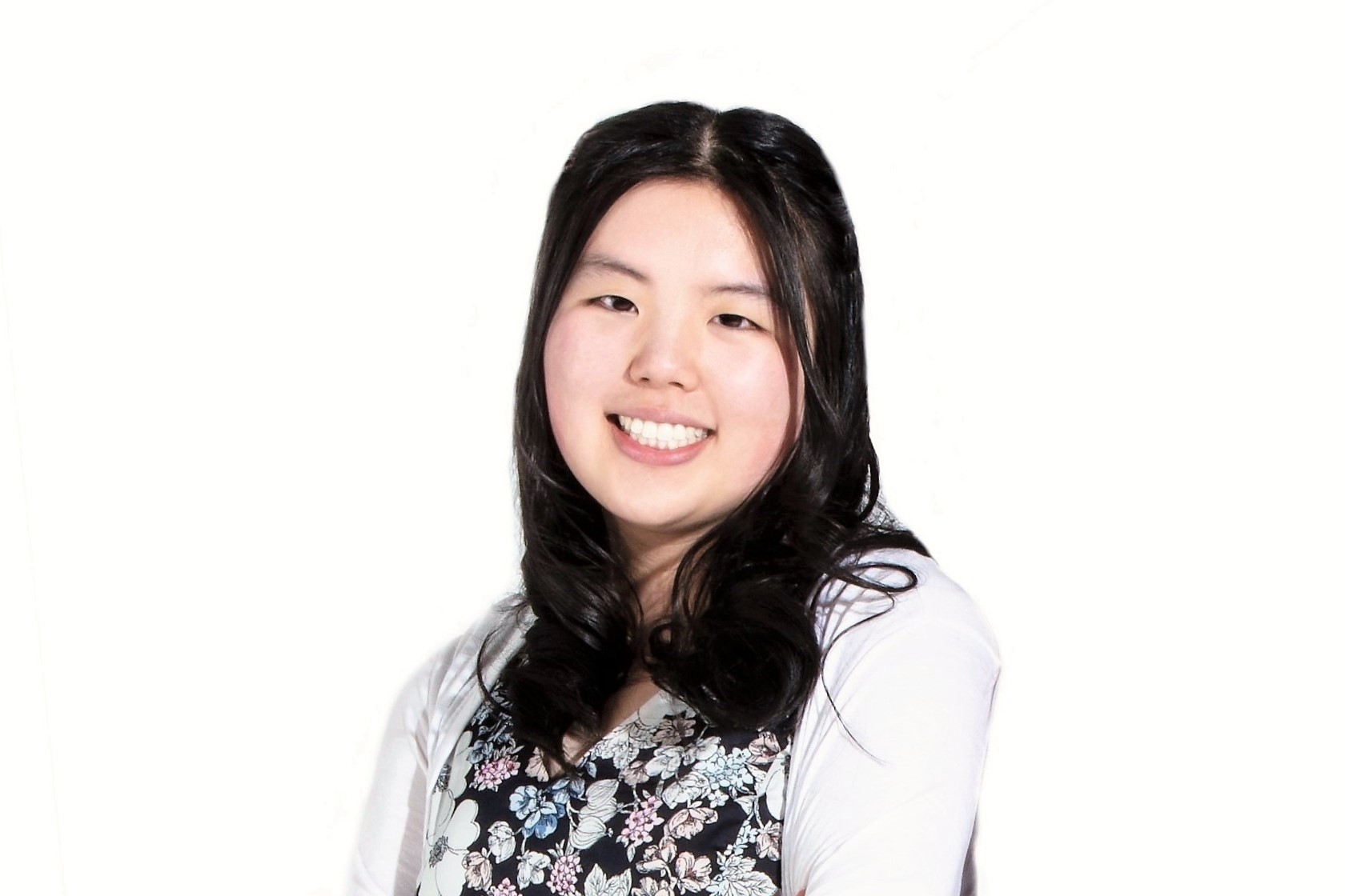 Michelle Xie, LET'S collaborator, is wearing a floral shirt and white cardigan.