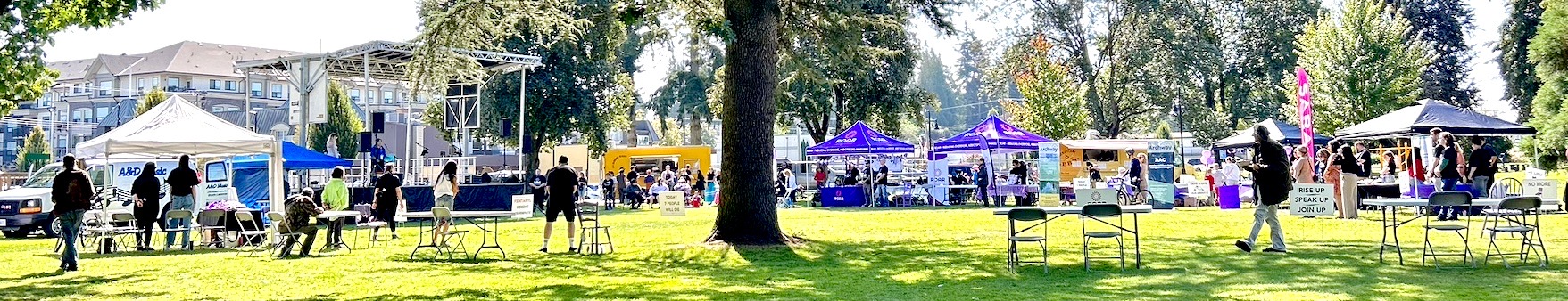 Panoramic photo of stage and booths at ROAR’s International Overdose Awareness Day, Abbotsford.